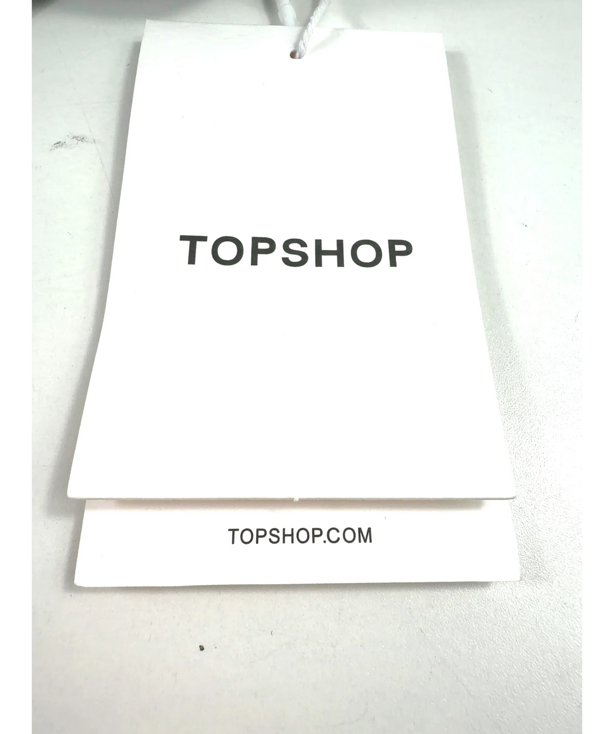 TOPSHOP Brown Jade mini wristlet grab bag — label