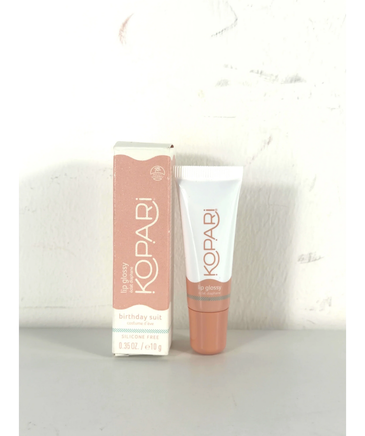 Kopari birthday suit Lip glossy, size 10g — label