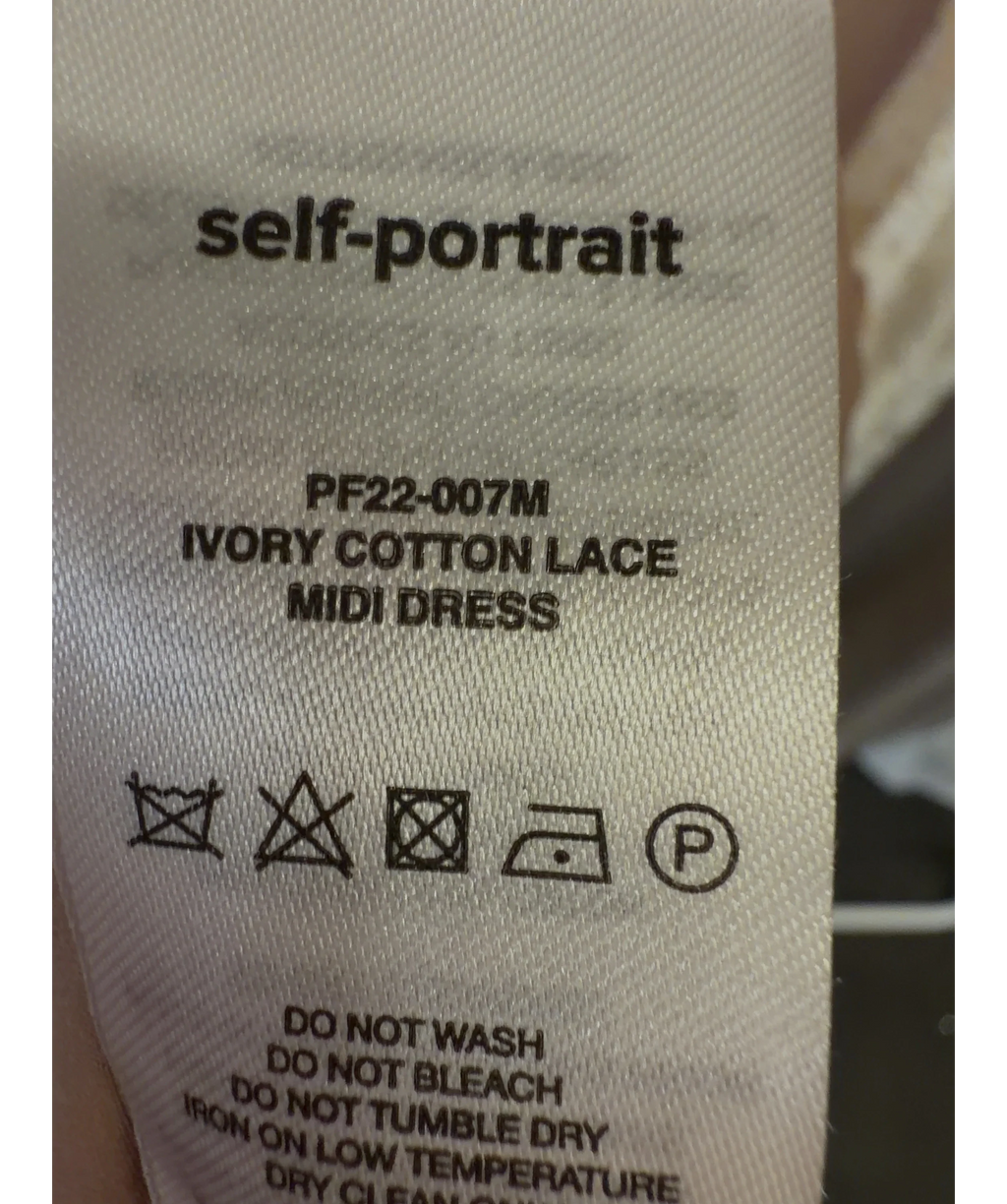 Self-Portrait Cream PF22-007M, size UK 4 — label