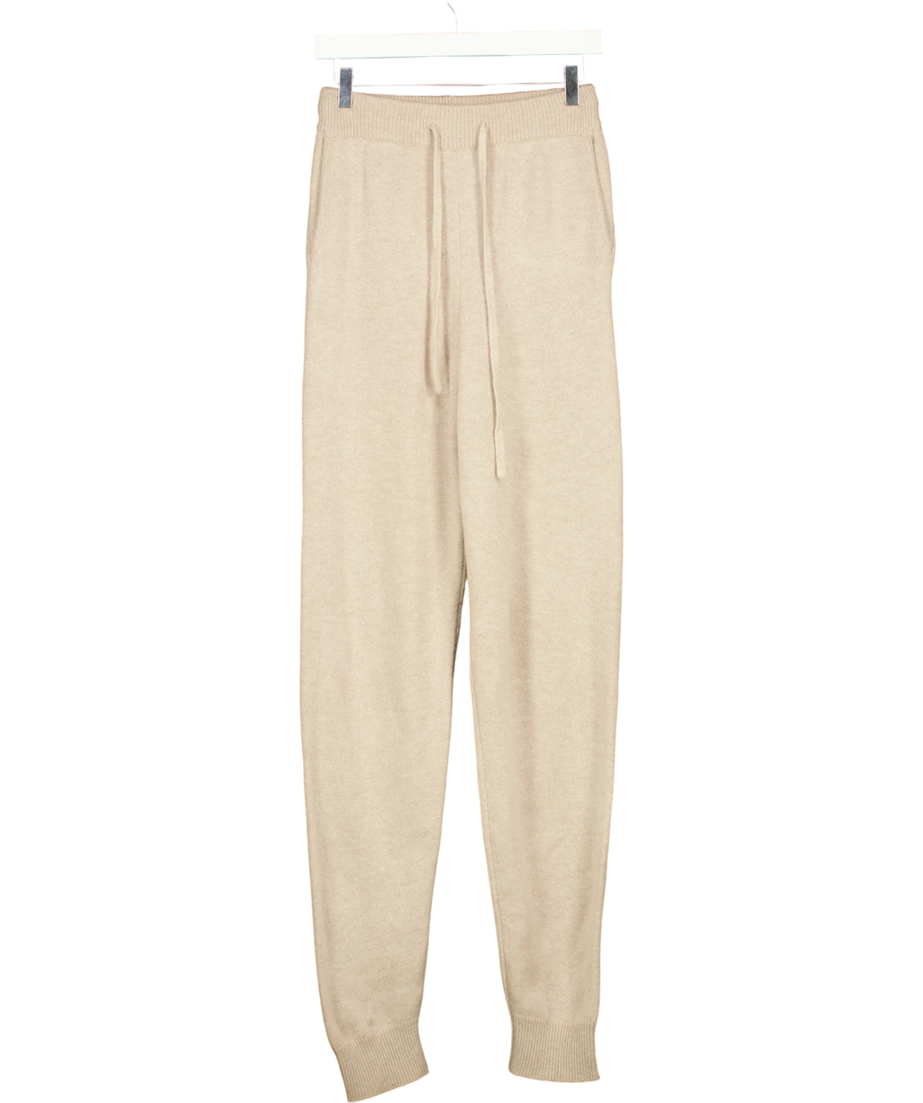 almada label Cream Colour, size UK M — front