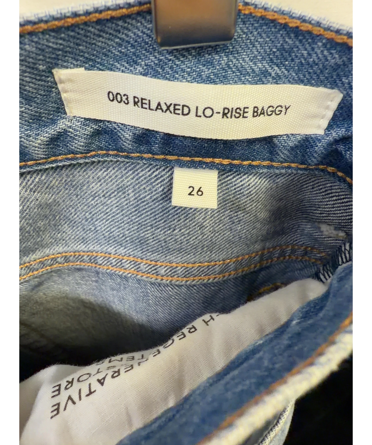 Aritzia Denim Forum light blue Relaxed Lo-Rise Baggy Jeans, size W26 — care label