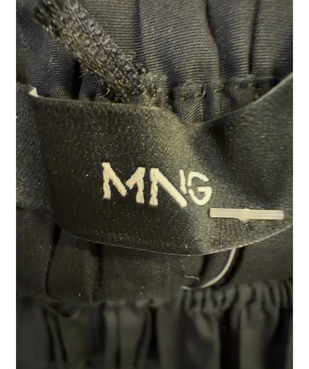 MANGO Black strapless smocked peplum top, size UK S — detail