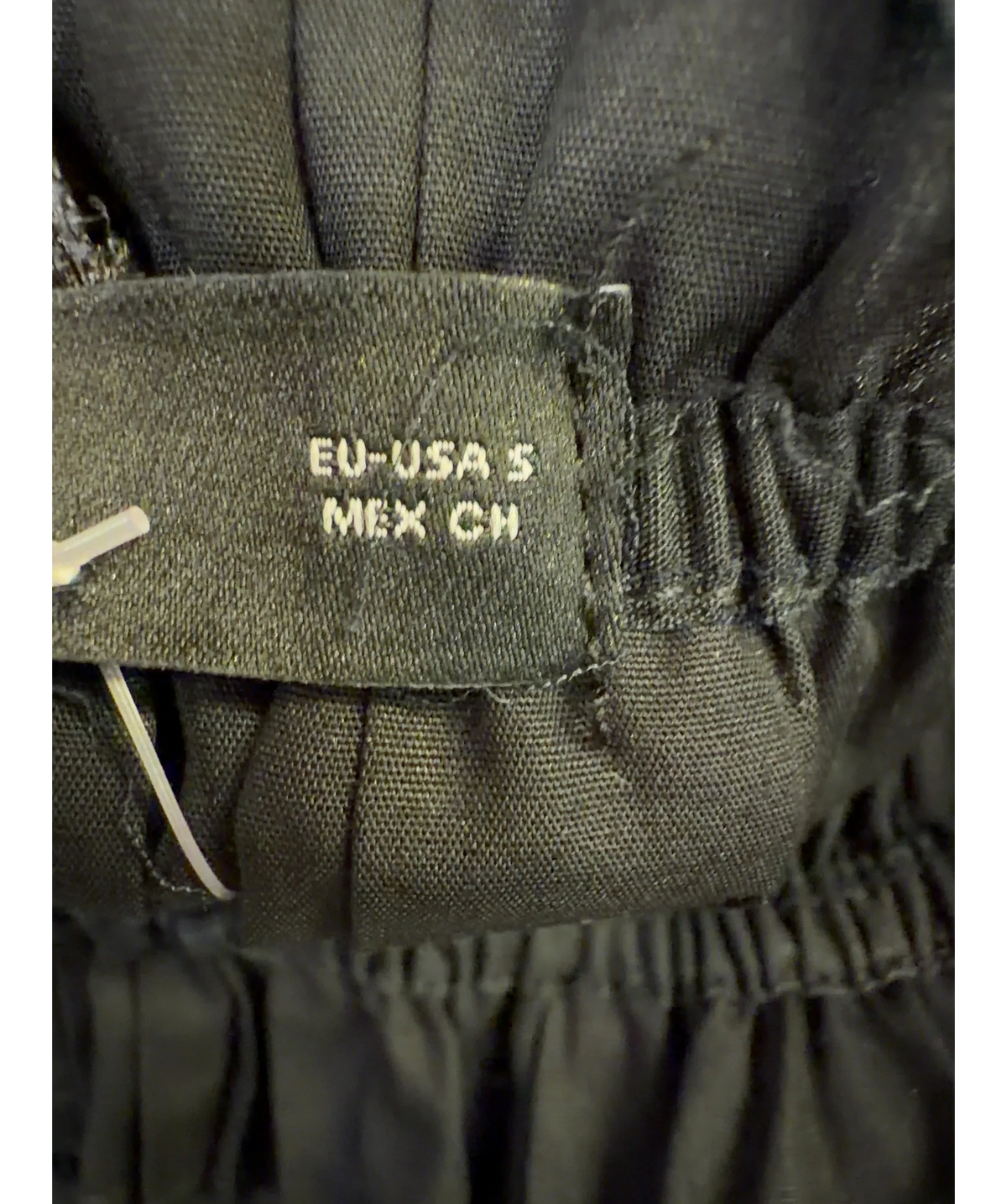 MANGO Black strapless smocked peplum top, size UK S — care label