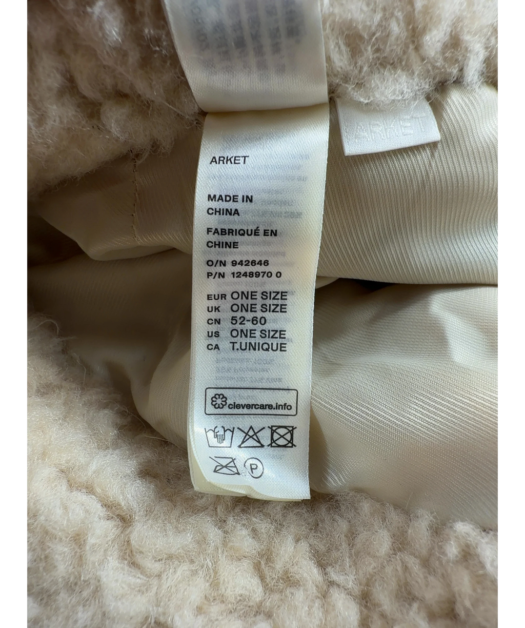 ARKET Beige Pile Hat — care label