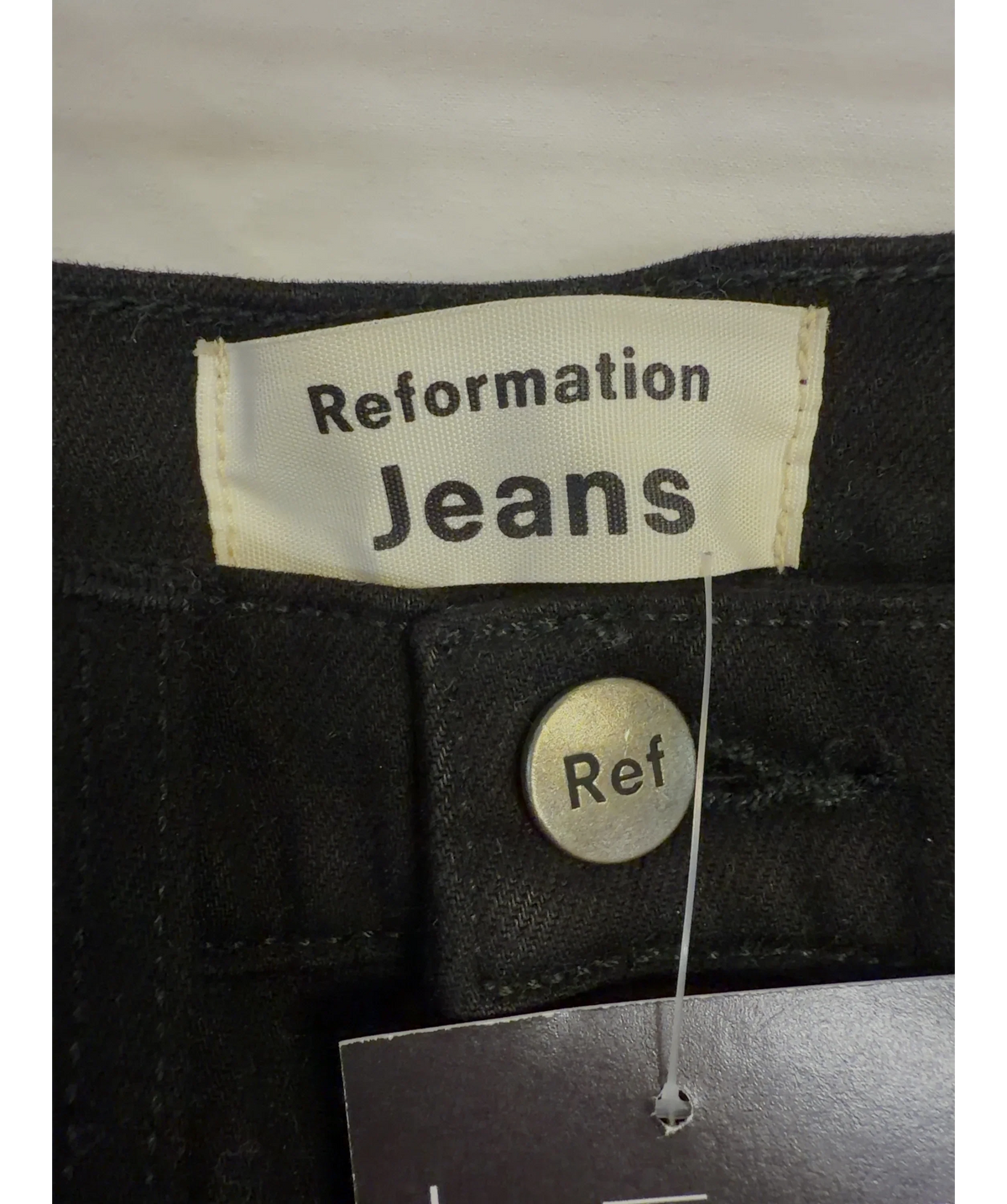 Reformation Black Ultra High & Skinny, size W24 — detail