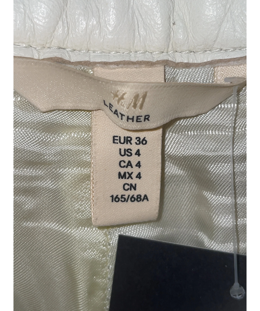 H&M Cream Colour, size UK 8 — care label