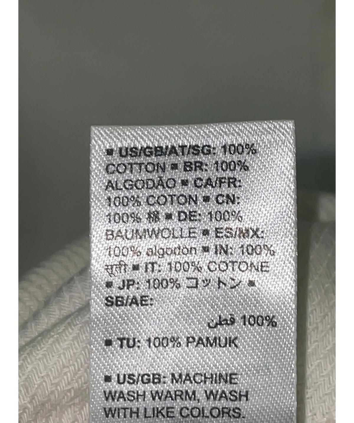 The Drop off-white Colour, size UK S — label