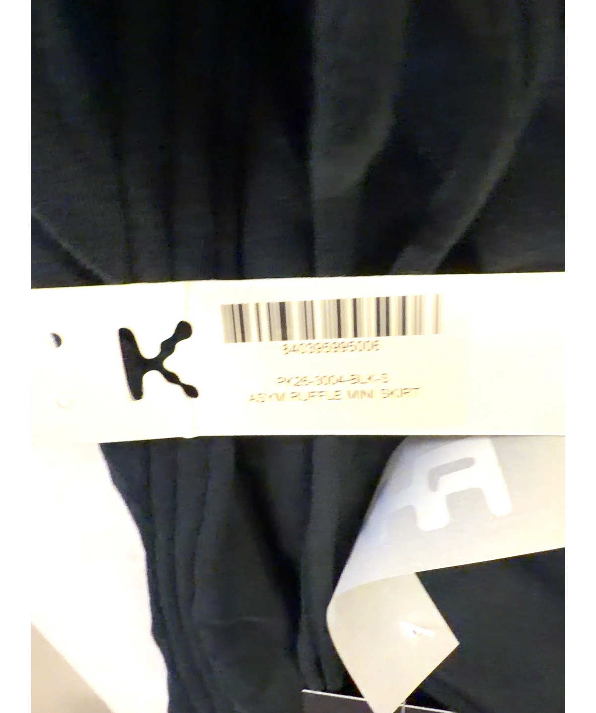 K Black ASYM RUFFLE MINI SKIRT, size UK S — care label
