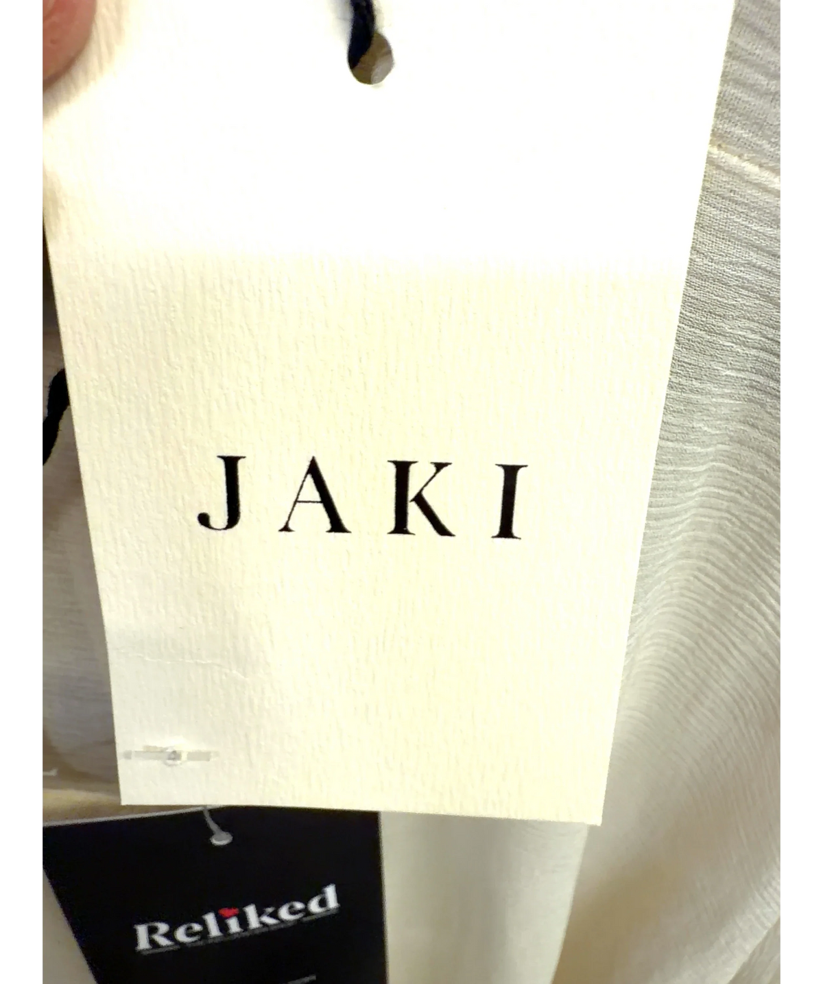 JAKI LONDON Cream Emberly Lightweight Poncho, size UK L/XL — detail