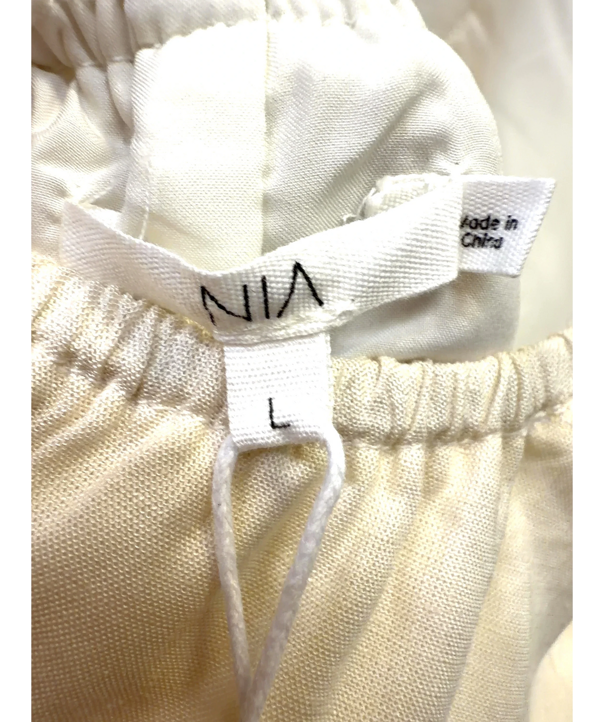 NIA Cream Halter Maxi Dress, size UK L — care label