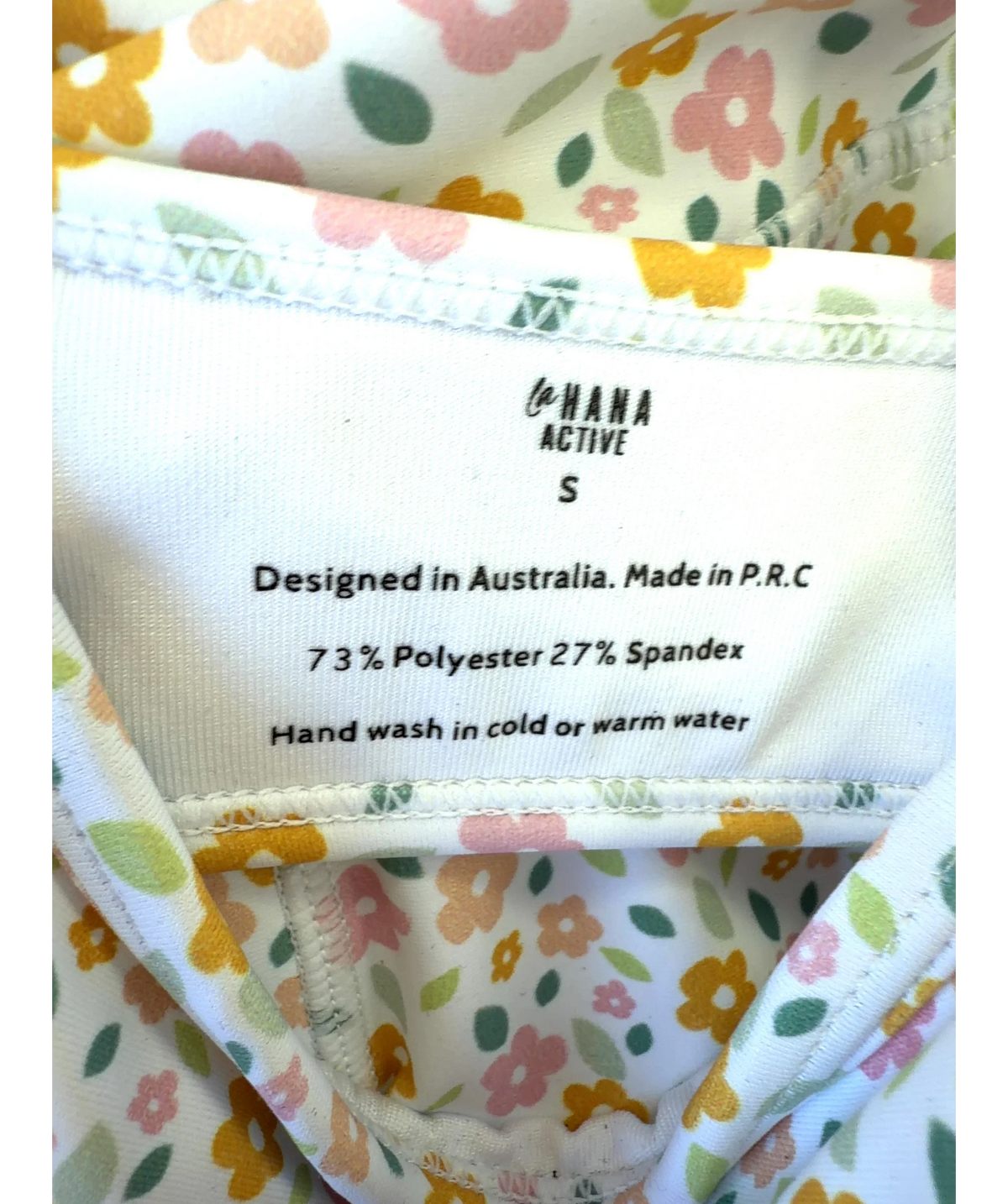 lahana active White Fleur, size UK S — label