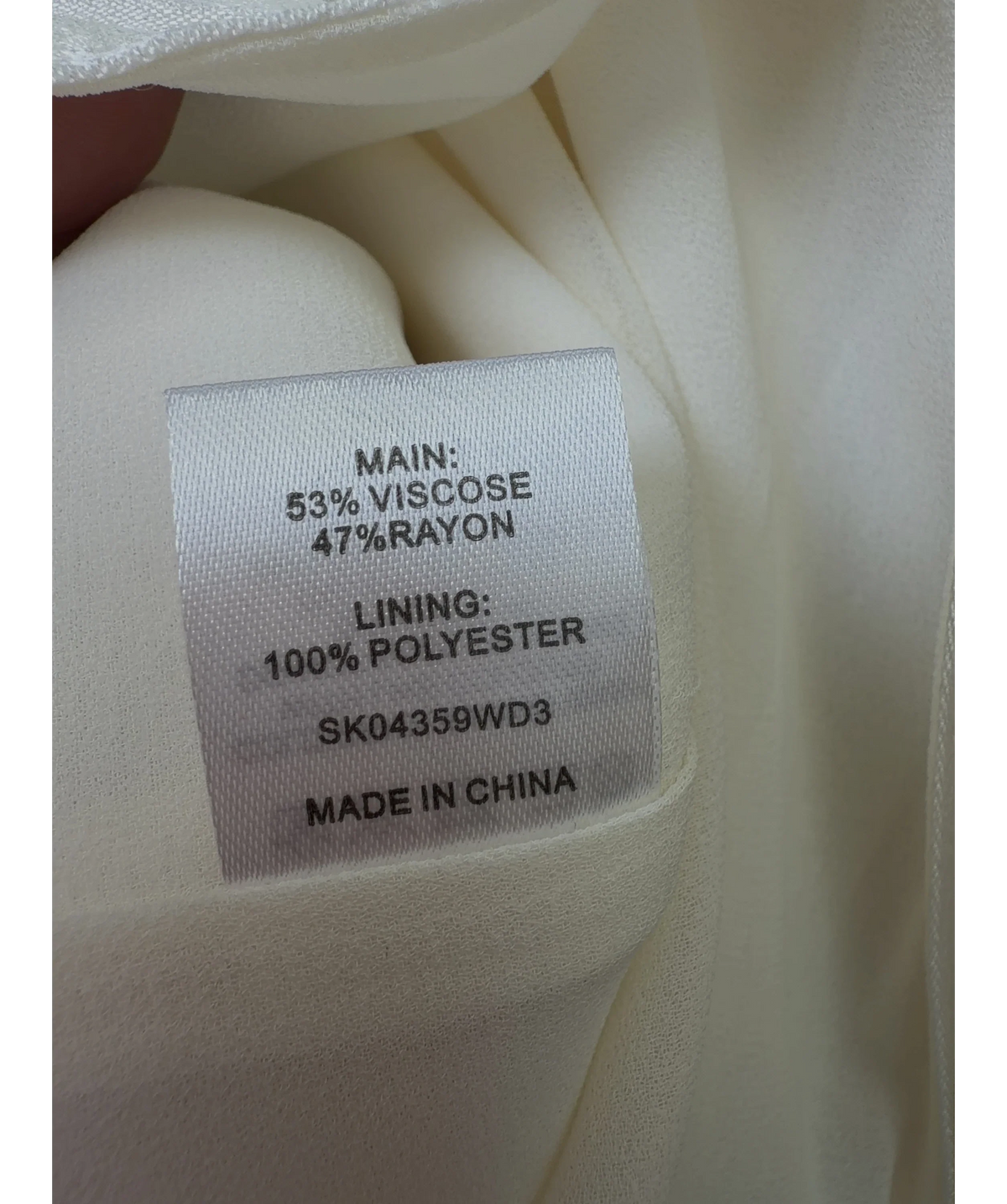 Meshki White white maxi skirt with rhinestone trim and side slit, size UK XS — label