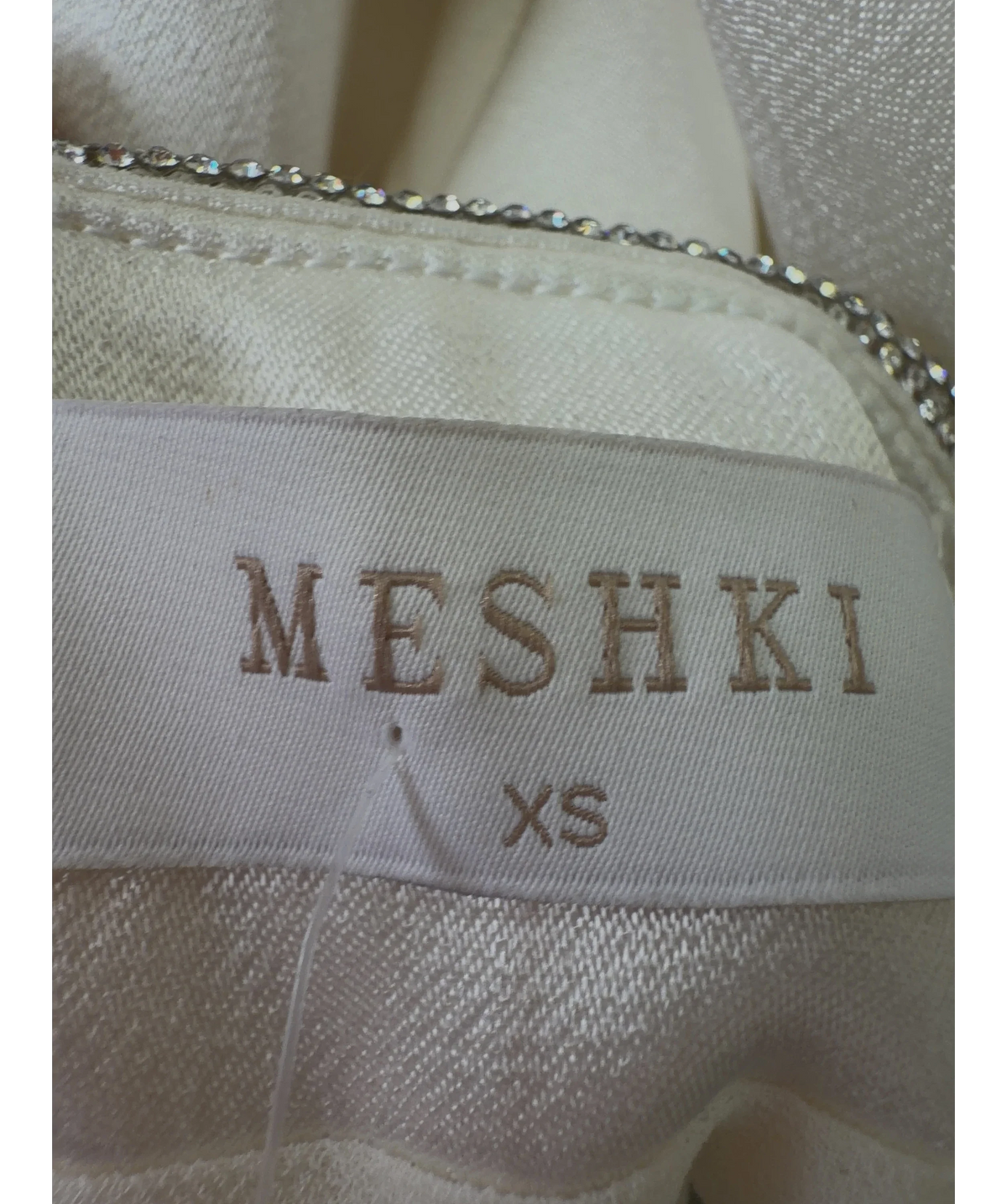 Meshki White white maxi skirt with rhinestone trim and side slit, size UK XS — care label