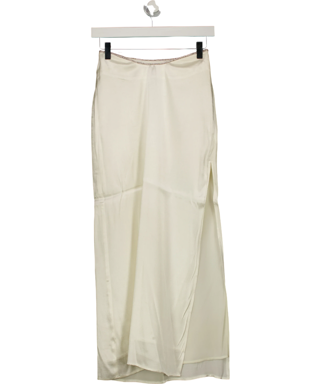Meshki White white maxi skirt with rhinestone trim and side slit, size UK XS — front