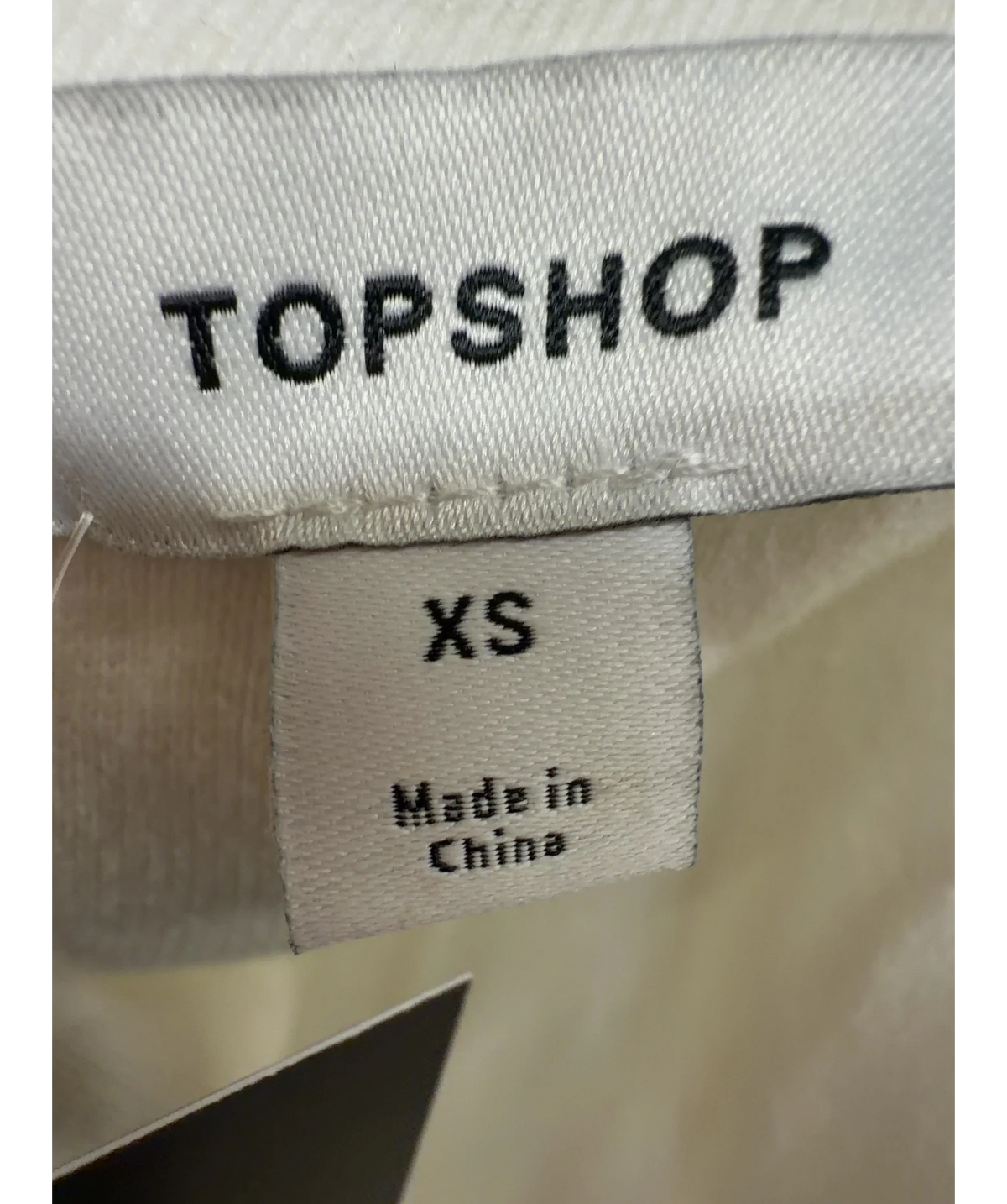 TOPSHOP White knitted compact peplum one-shoulder top, size UK XS — care label