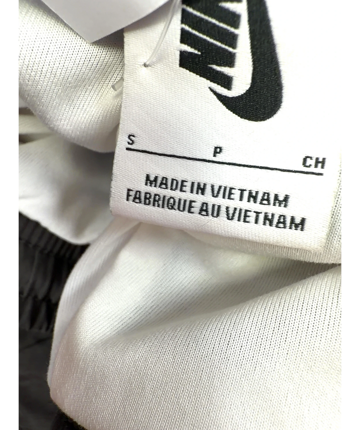 Nike Brown Woven track pants, size UK S — care label