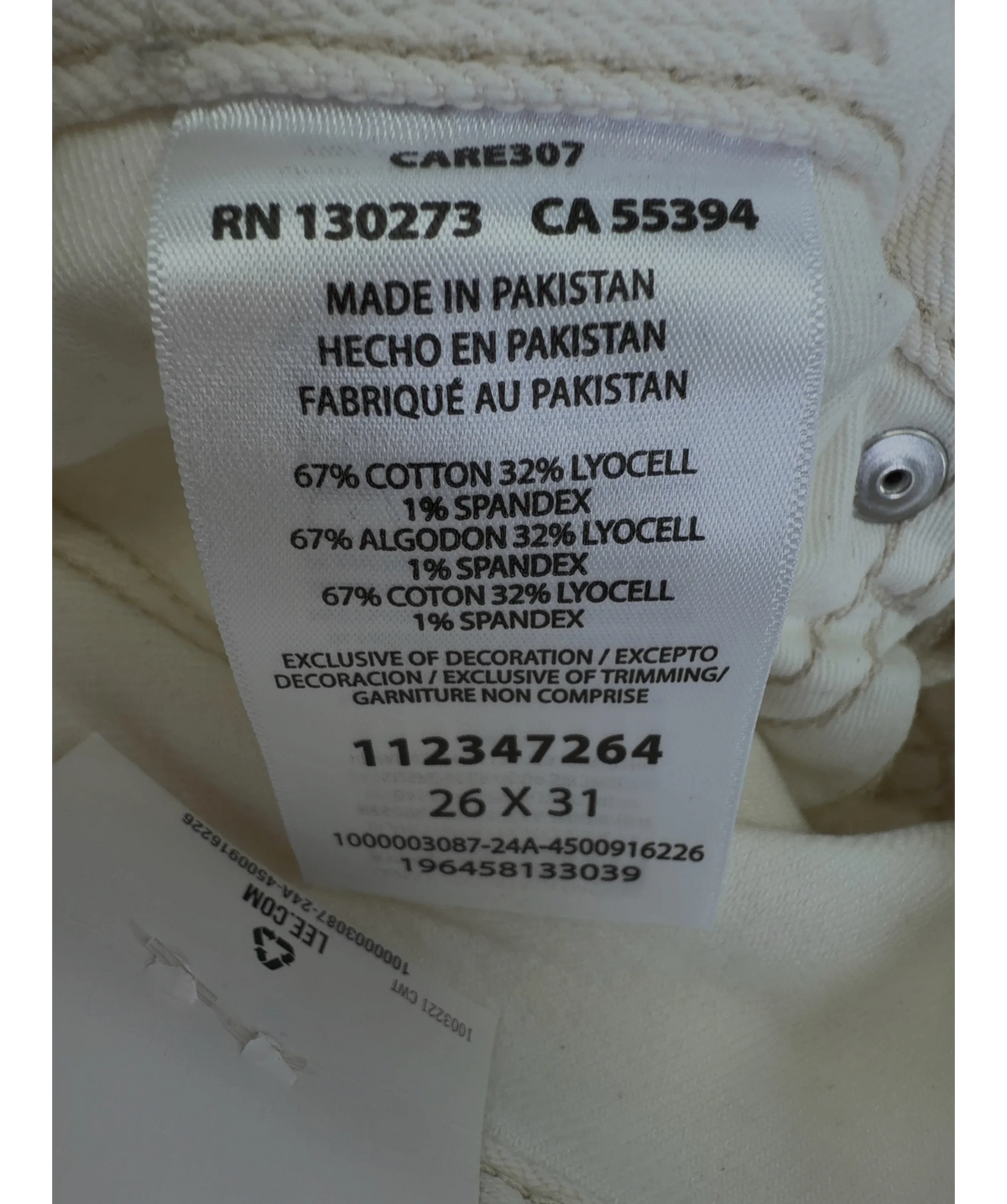 Lee cream Mid Rise Rider Slim Straight, size W26 — label