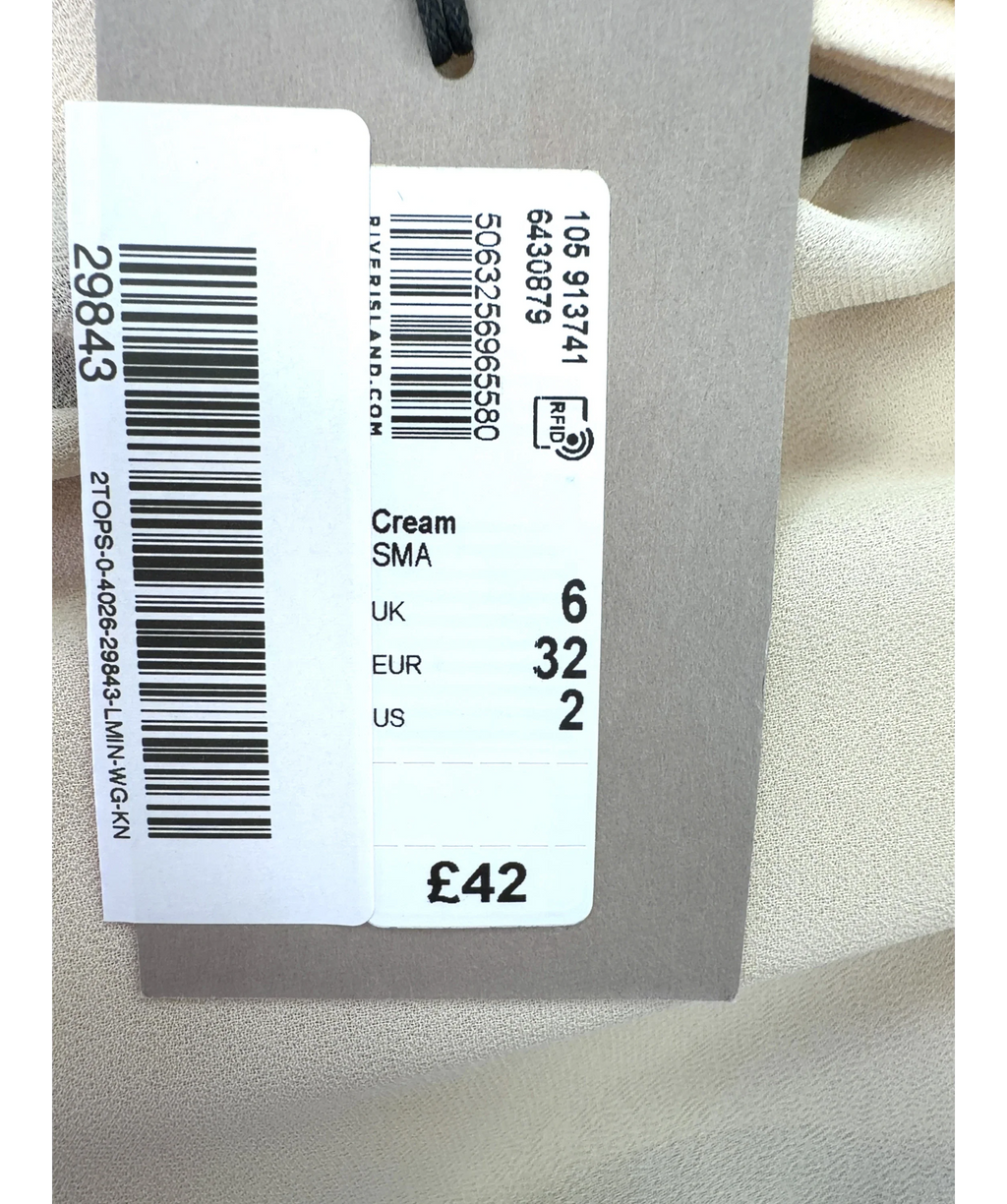River Island Cream tiered ruffle mock-neck blouse, size UK 6 — care label