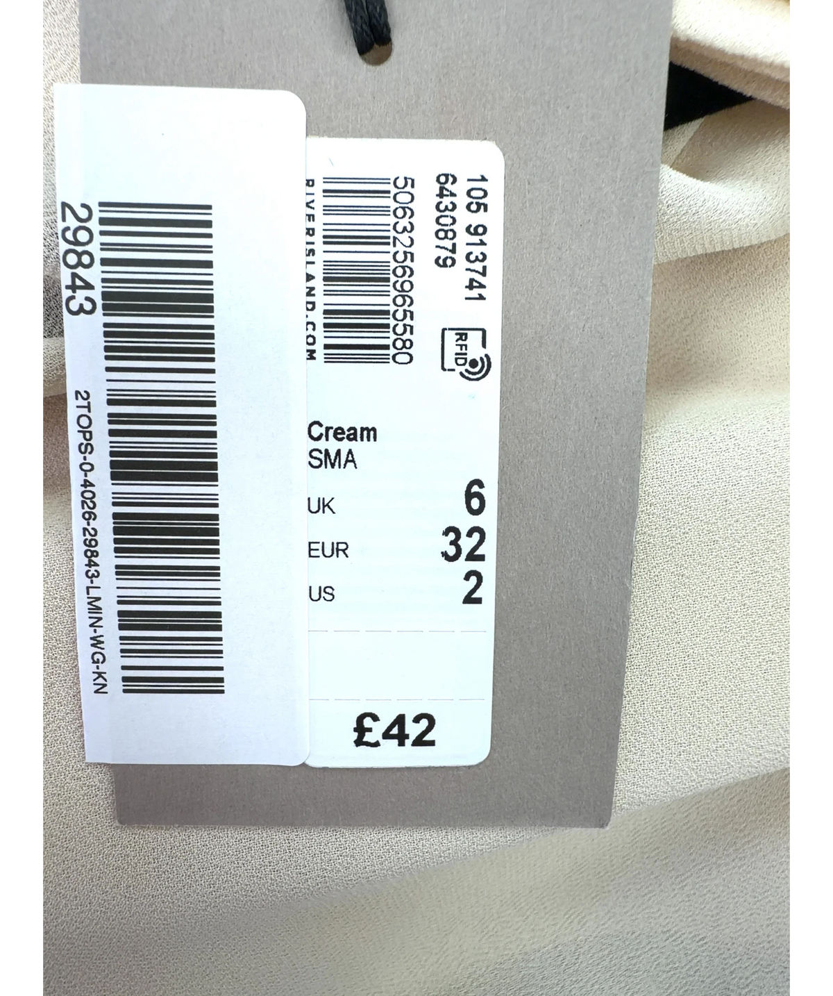 River Island Cream tiered ruffle mock-neck blouse, size UK 6 — care label