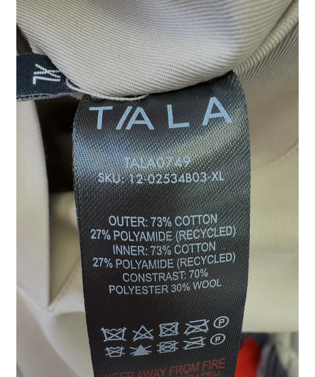TALA navy Colour, size UK XL — label