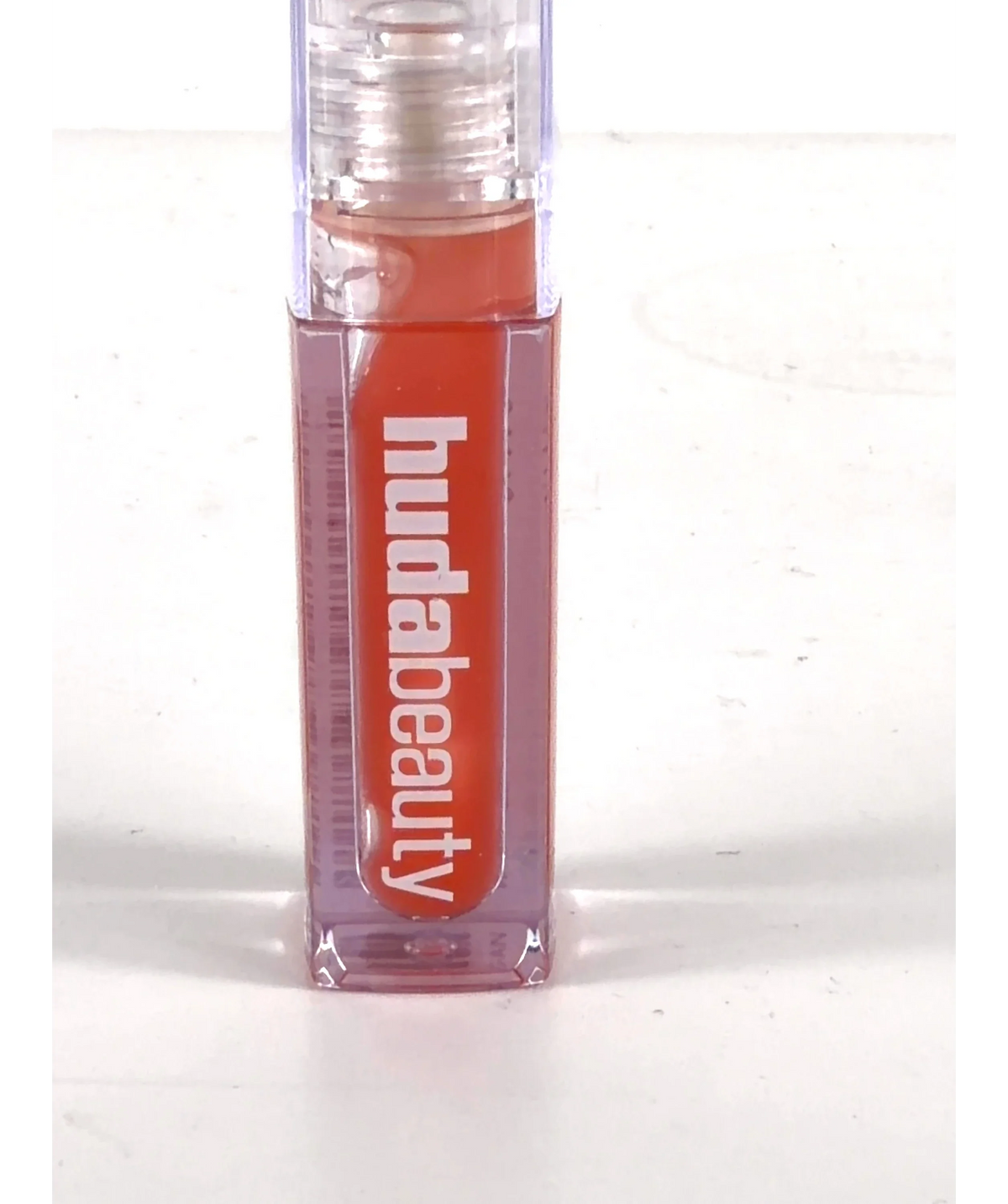 Huda Beauty JUICY PEACH FAUX FILLER, size 3.9ml — label