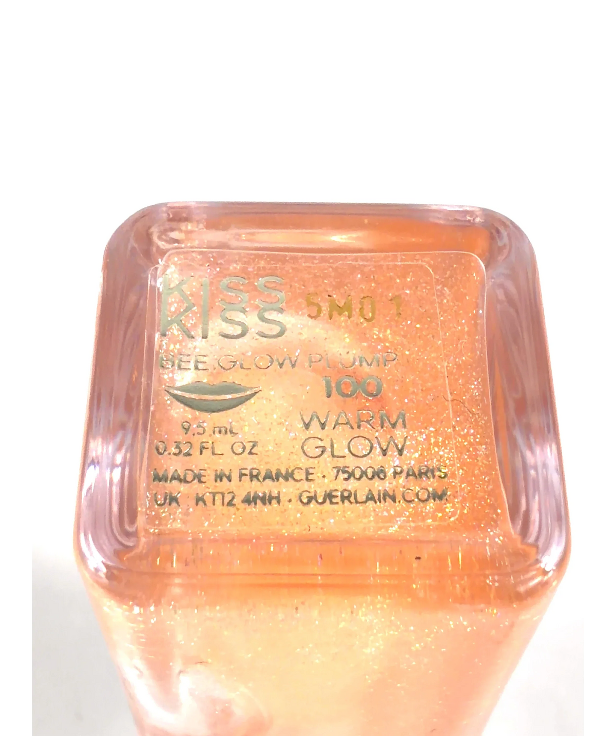 Guerlain 100 Warm Glow BEE GLOW PLUMP, size 9.5ml — fabric detail