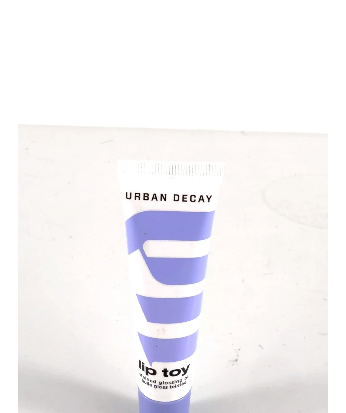 Urban Decay Caked Up Lip Toy Stained Glossing Oil, size 12ml — label