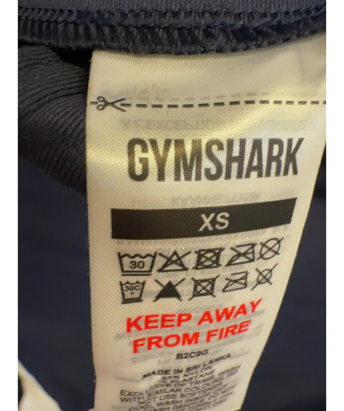 GYMSHARK navy Soft Sculpt Zip Up Jacket, size UK XS — care label