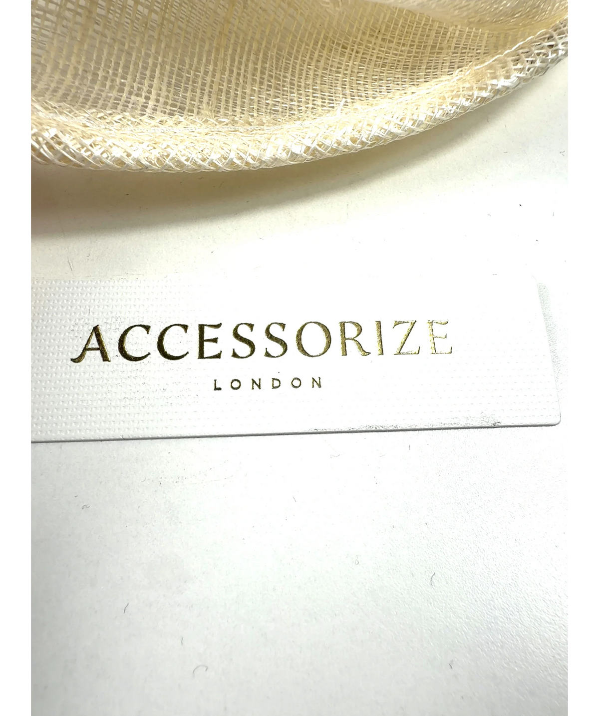 Accessorize Cream Structured Disc Bow Fascinator — detail