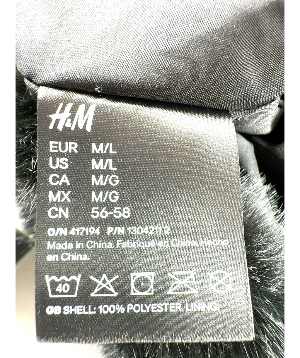 H&M Black faux-fur style fluffy hat, size UK M/L — label