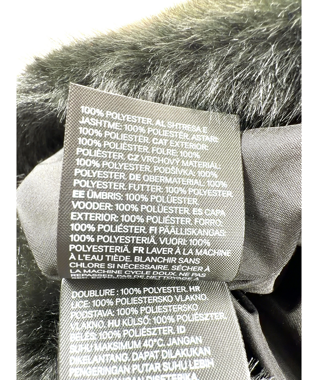 H&M Black faux-fur style fluffy hat, size UK M/L — care label