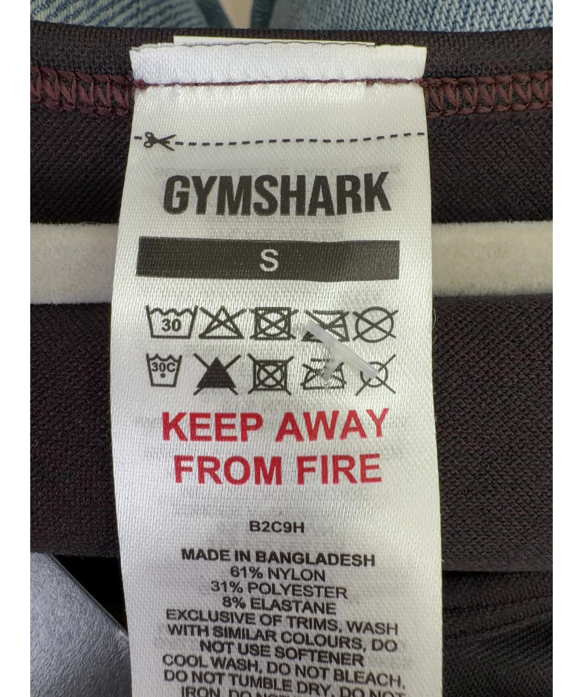 GYMSHARK dark brown Colour, size UK S — care label