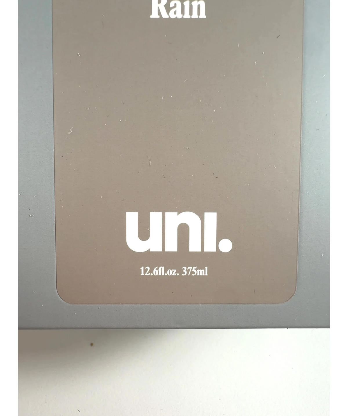 uni Rain Gentle Exfoliating Body Wash, size 375ml — label
