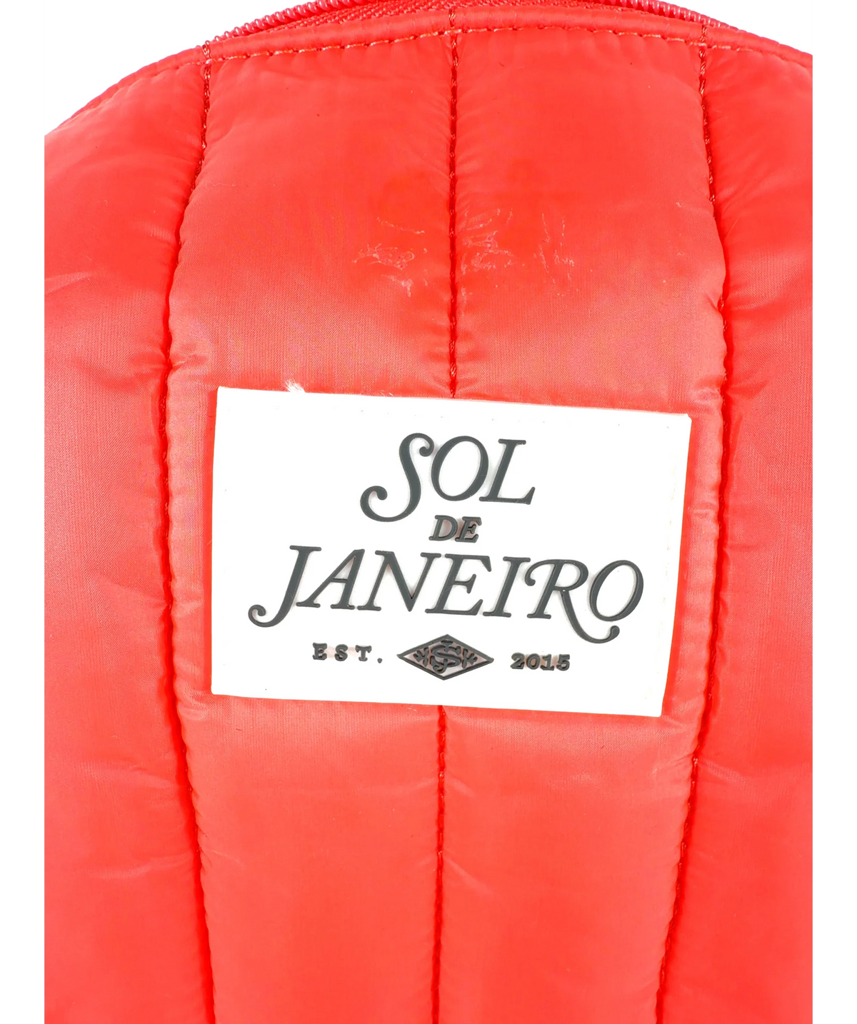 Sol de Janeiro red quilted cosmetic/toiletry pouch, size 1 — label