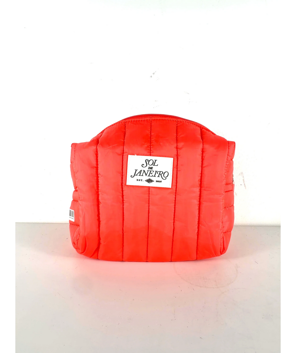 Sol de Janeiro red quilted cosmetic/toiletry pouch, size 1 — care label