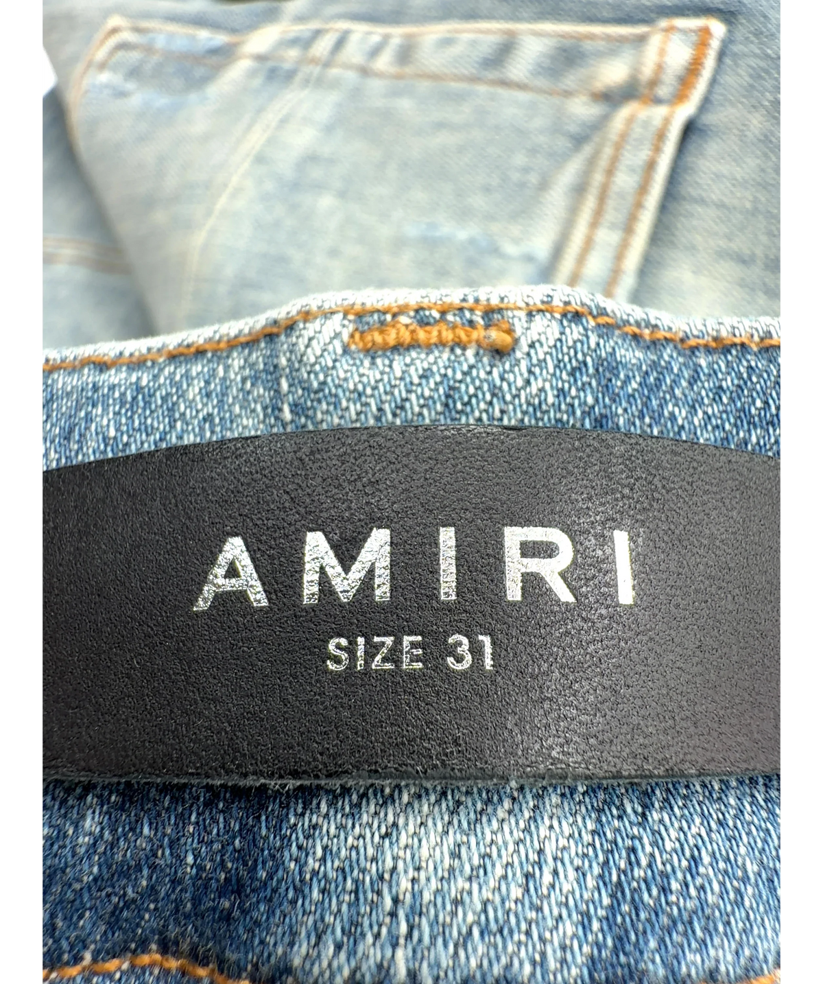 Amiri light blue MX1, size W31 — care label