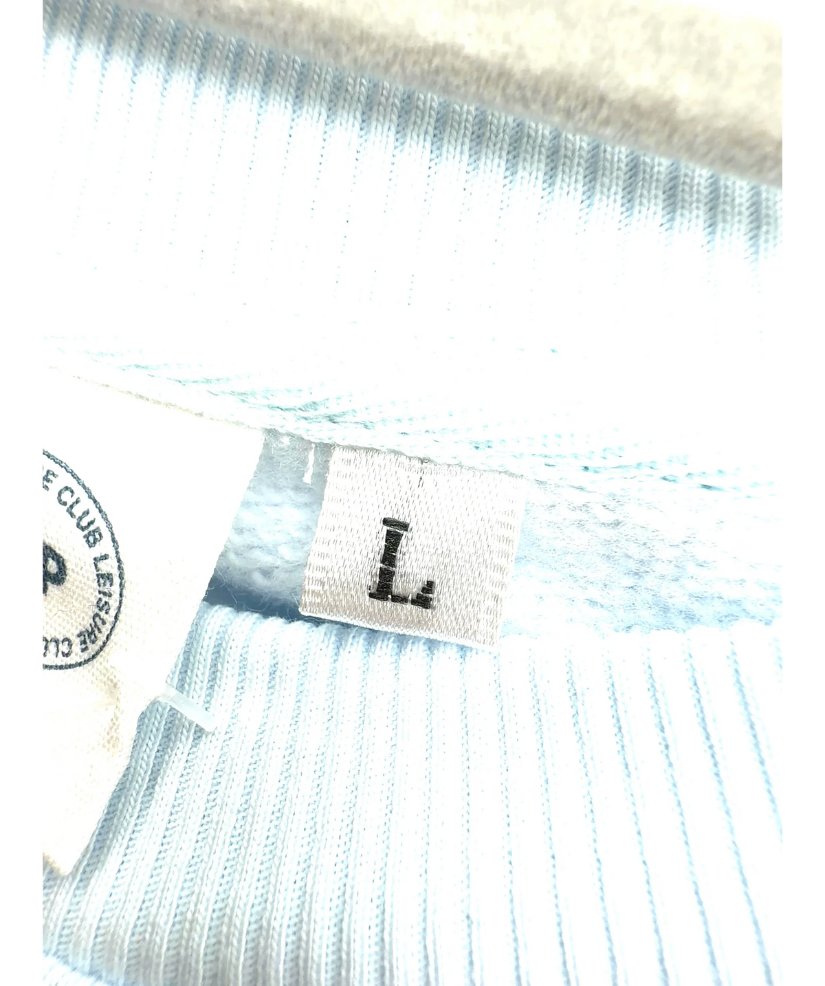 Trip light blue Colour, size UK L — care label