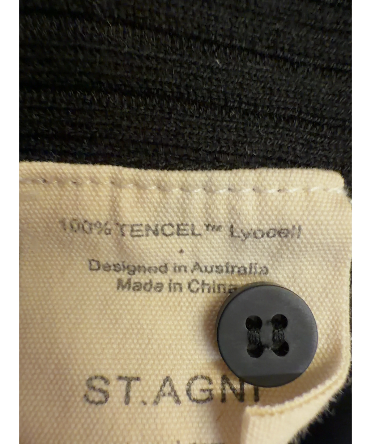 St Agni Black Colour, size UK M — label