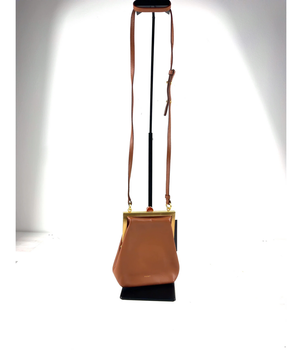 nuer Brown structured trapezoidal frame cross-body bag — fabric detail