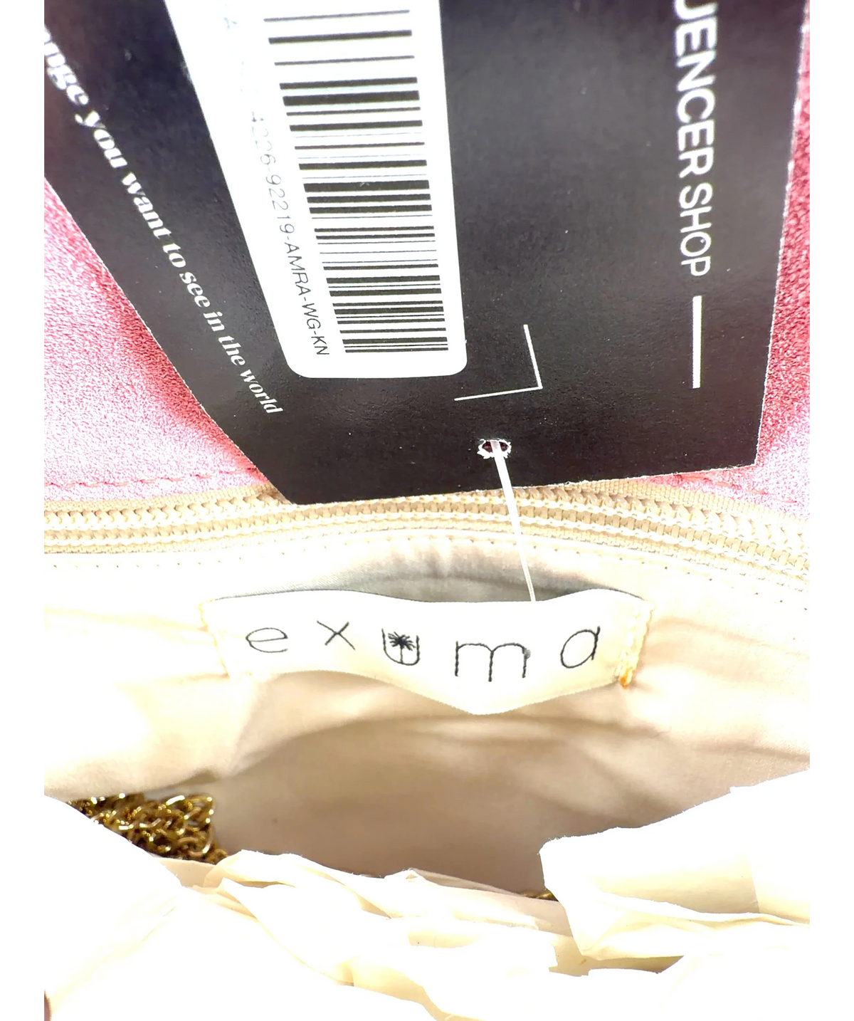 Anthropologie Pink leather/suede envelope clutch with pom-pom trim and a chain strap — label