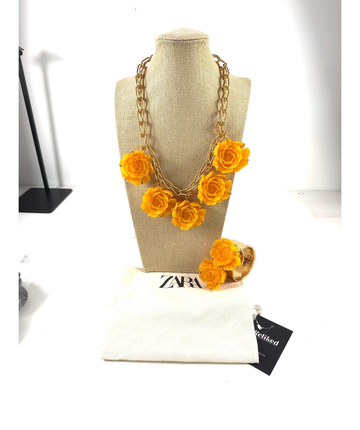 ZARA Yellow Metal Resin Flower Necklace and the Maxi Metal Resin Flower Bracelet — label
