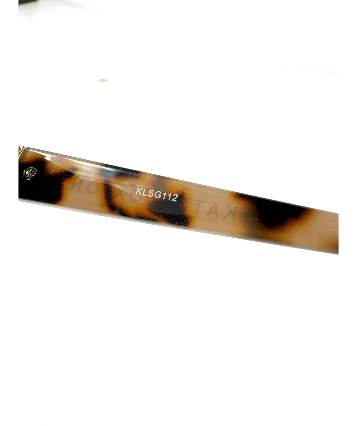 Katie Loxton Brown Colour — label