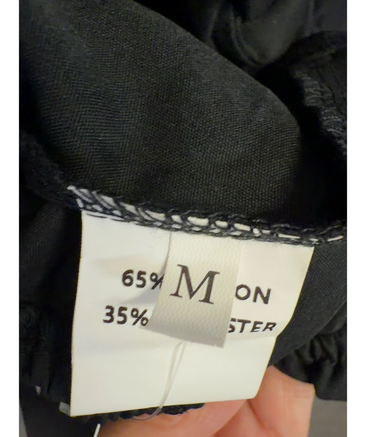 Amazon Black Colour, size UK M — care label
