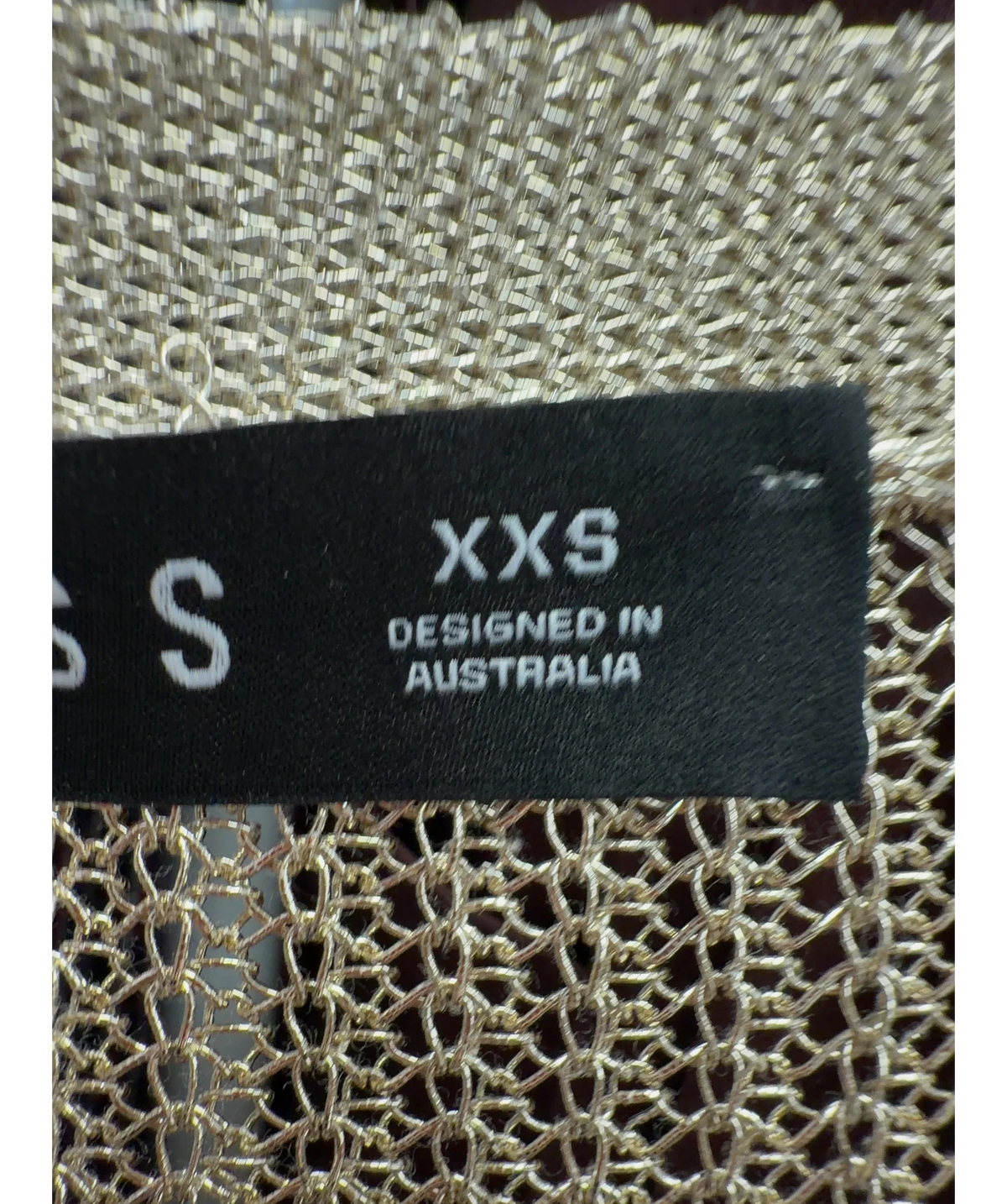 Lioness gold Colour, size UK XXS — care label