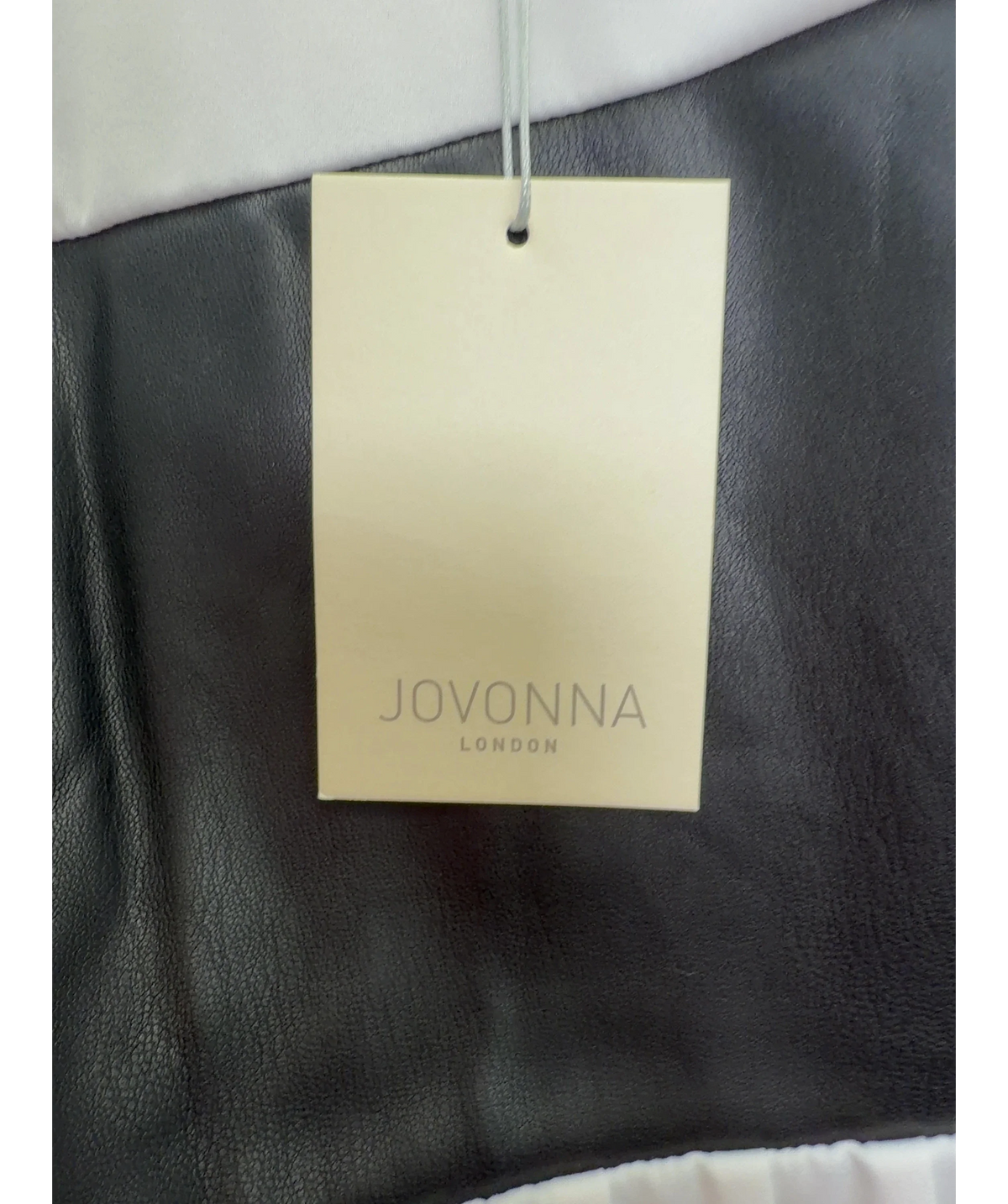 Jovonna London White colorblock pleated shift dress, size UK XS — detail