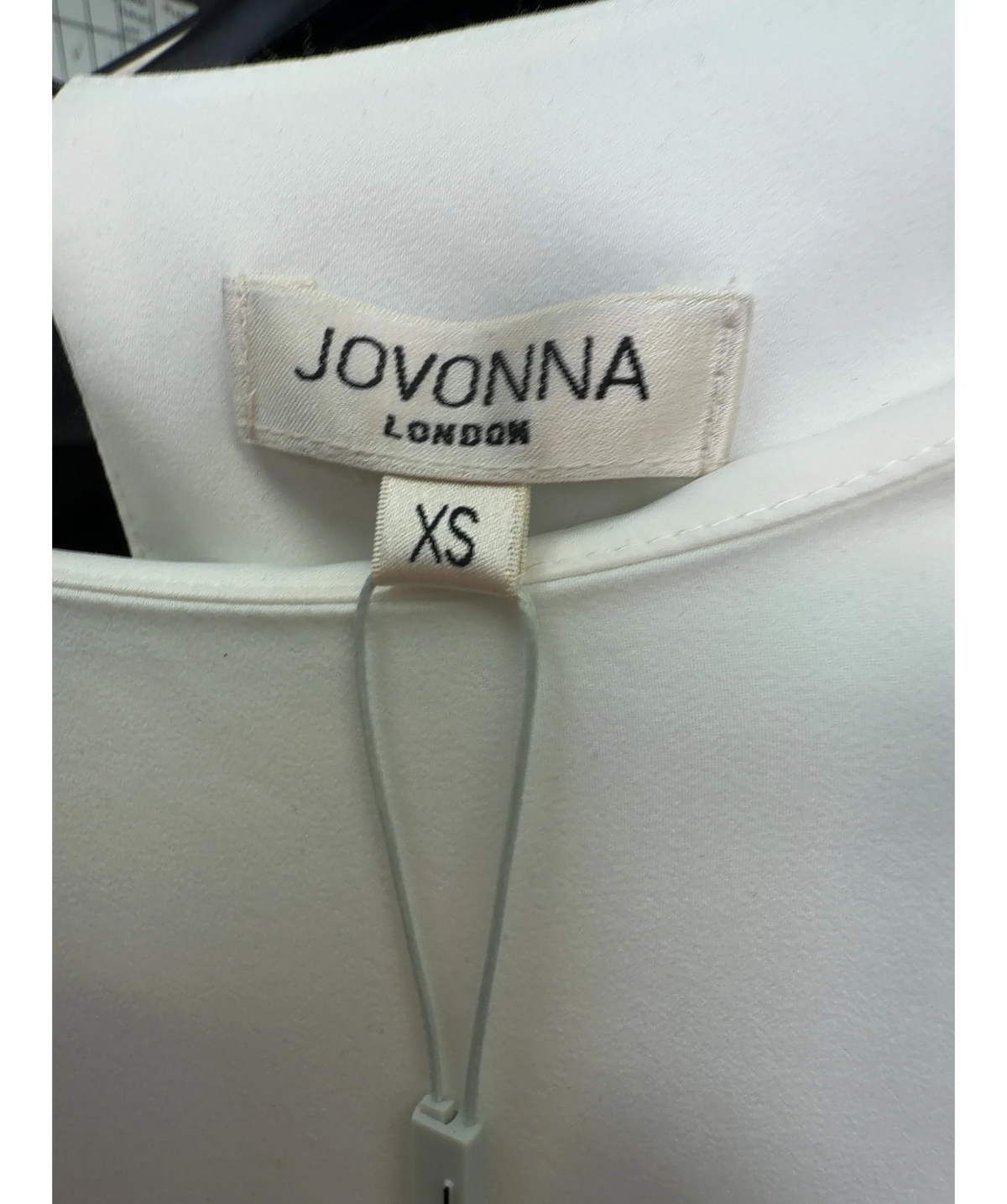 Jovonna London White colorblock pleated shift dress, size UK XS — care label