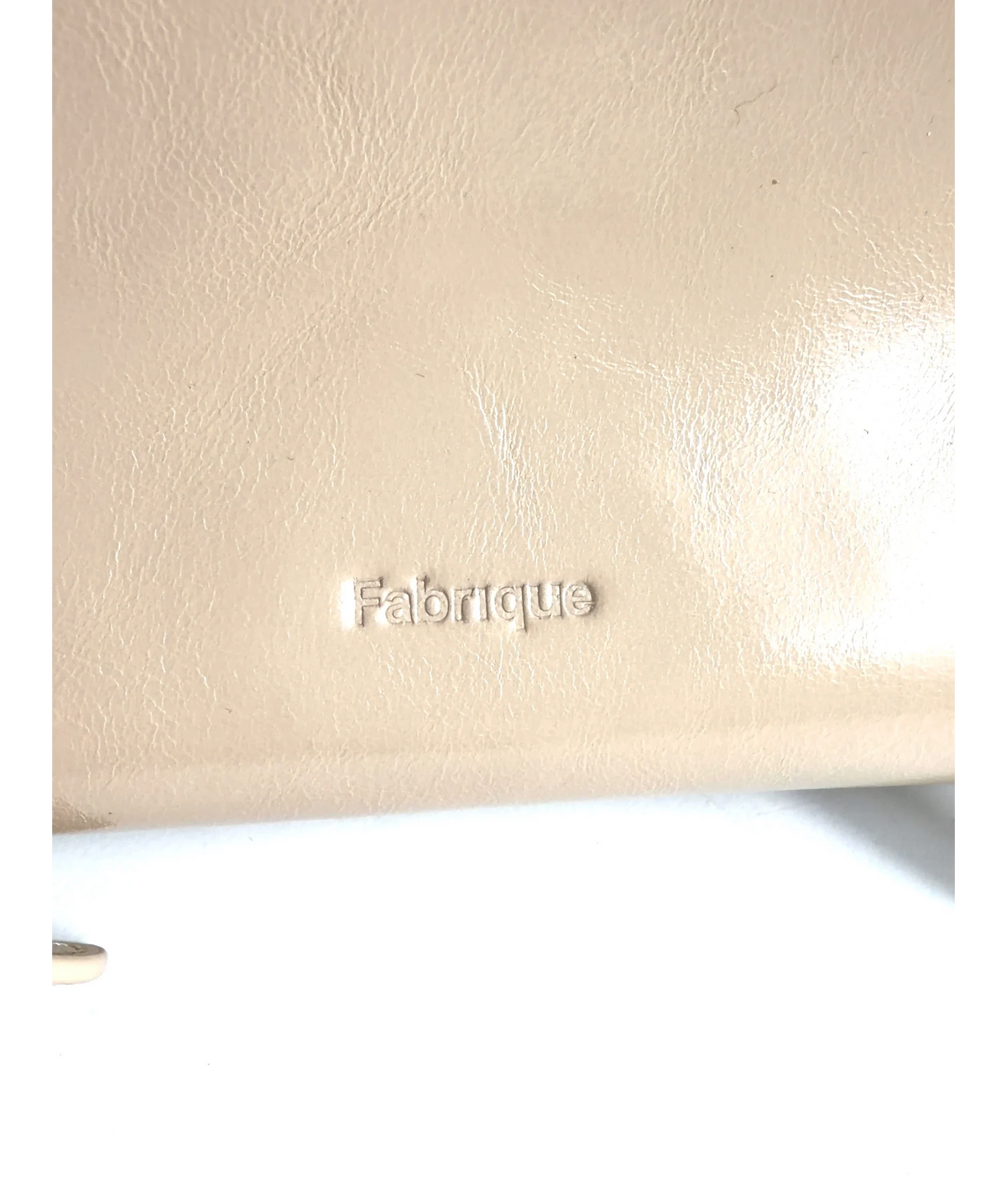 Fabrique Beige East West Shoulder Bag — label