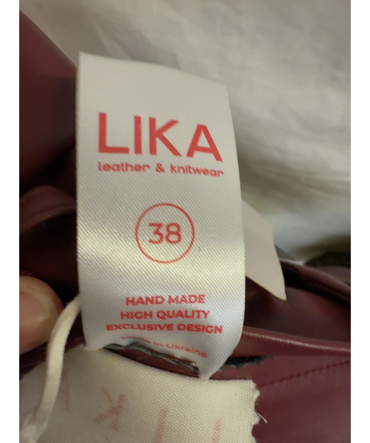 LIKA burgundy Colour, size UK 10 — care label