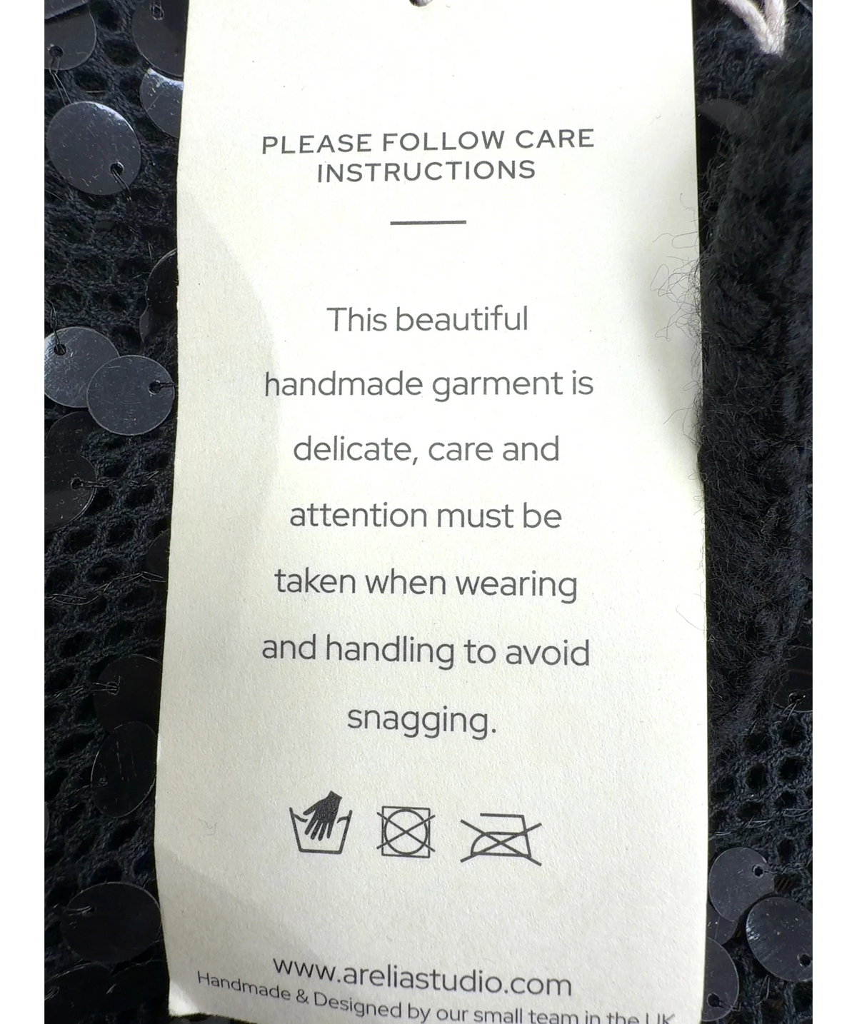 Arelia Studio Black Colour — label
