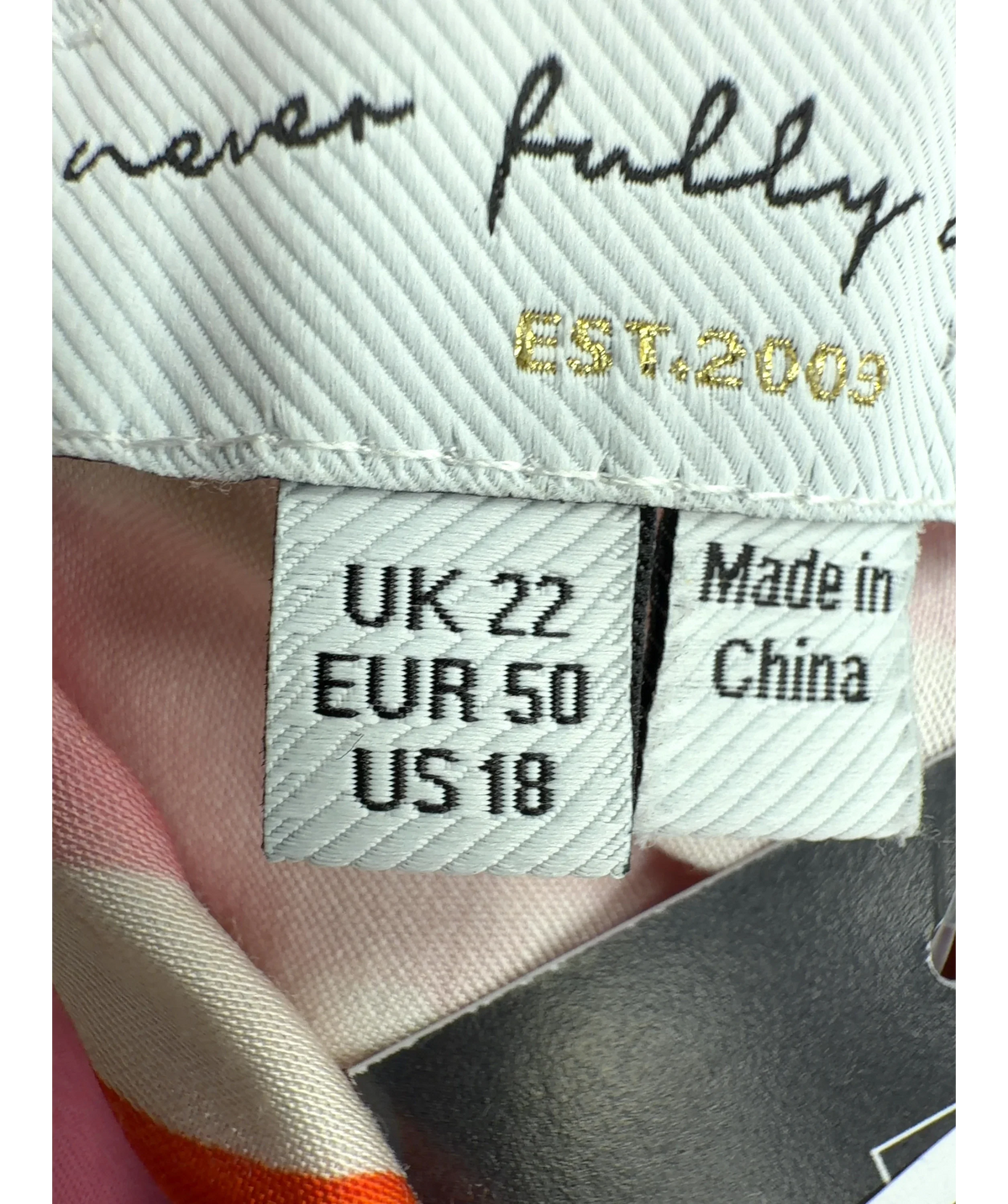 Never Fully Dressed Pink Dallas Dorris Skirt, size UK 22 — care label